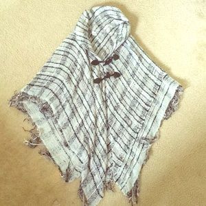 Grey poncho. Very cute. Bought at Cracker Barrel.